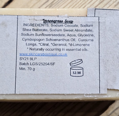 Bar of skincareBOOtique Lemongrass soap with a label showing ingredients and branding details.