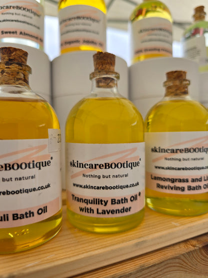 Bottles of skincareBOOtique bath oil showing lavender bath Oil, and Lemongrass and lime bath oil